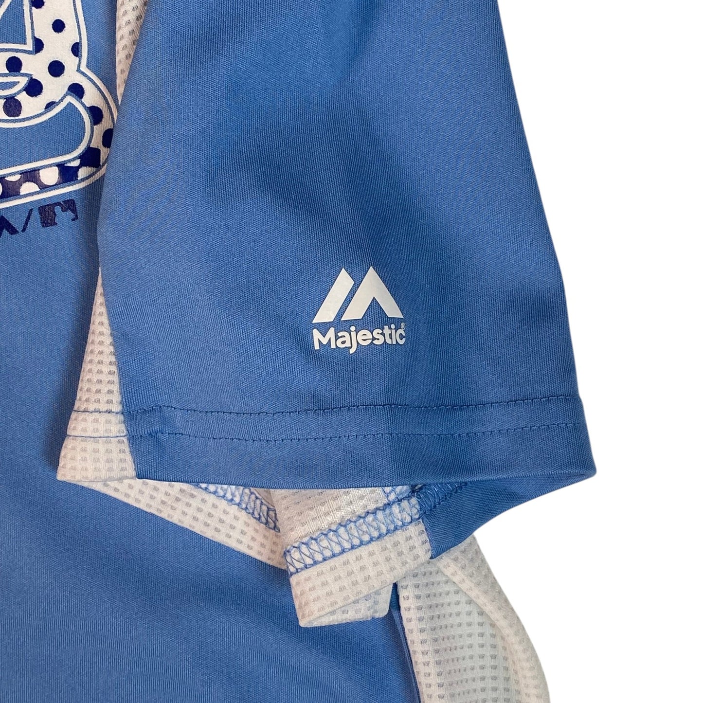 Digg It Thrift & Vintage blue Majestic Cool Base Kansas City Royals baseball jersey sleeve with white logo detail