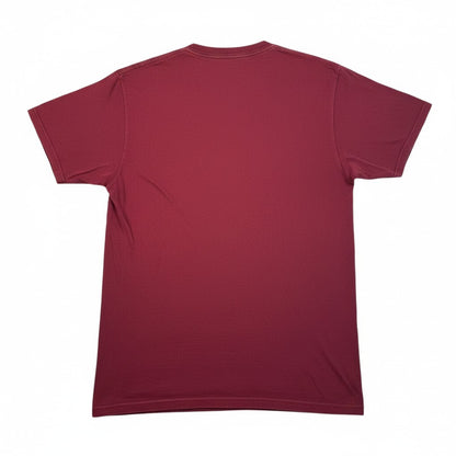 Back view of a plain maroon Stüssy World Tour cotton t-shirt from Digg It Thrift & Vintage
