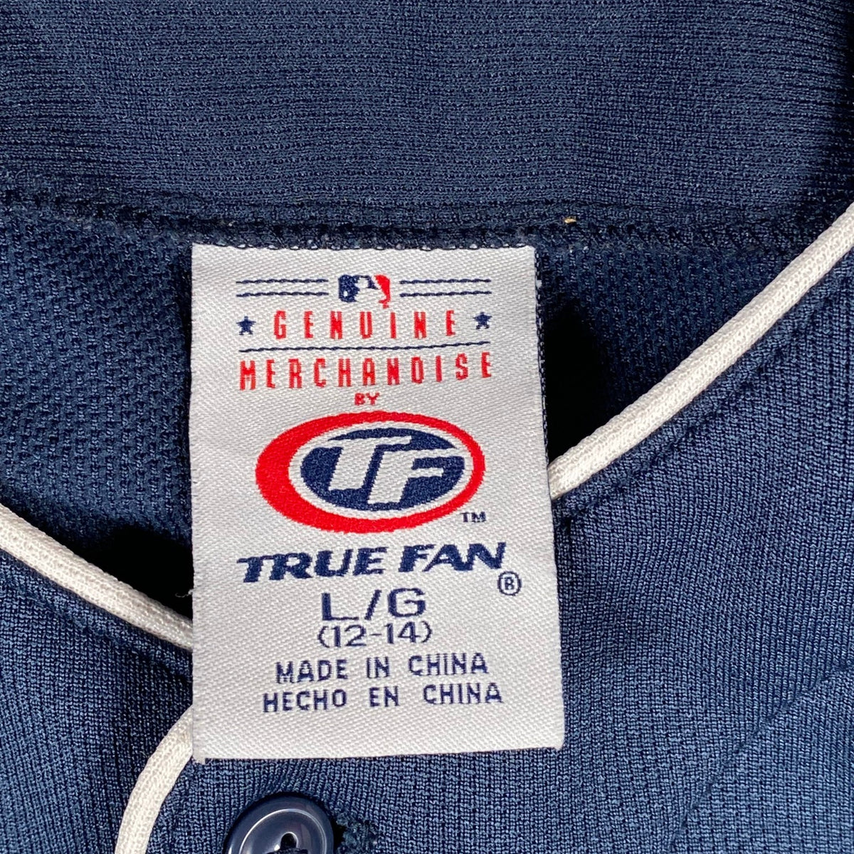 Digg It Thrift & Vintage True Fan MLB Milwaukee Brewers baseball jersey size tag showing L/G 12-14 on navy fabric