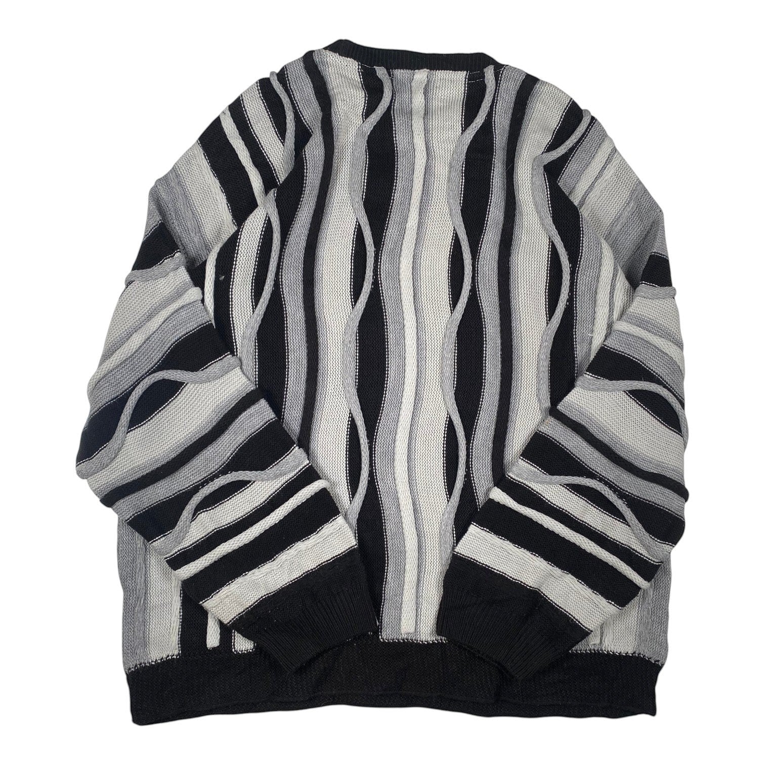 Digg It Thrift & Vintage boohooMAN monochromatic wavy cable knit sweater with black, grey, and white vertical stripes.