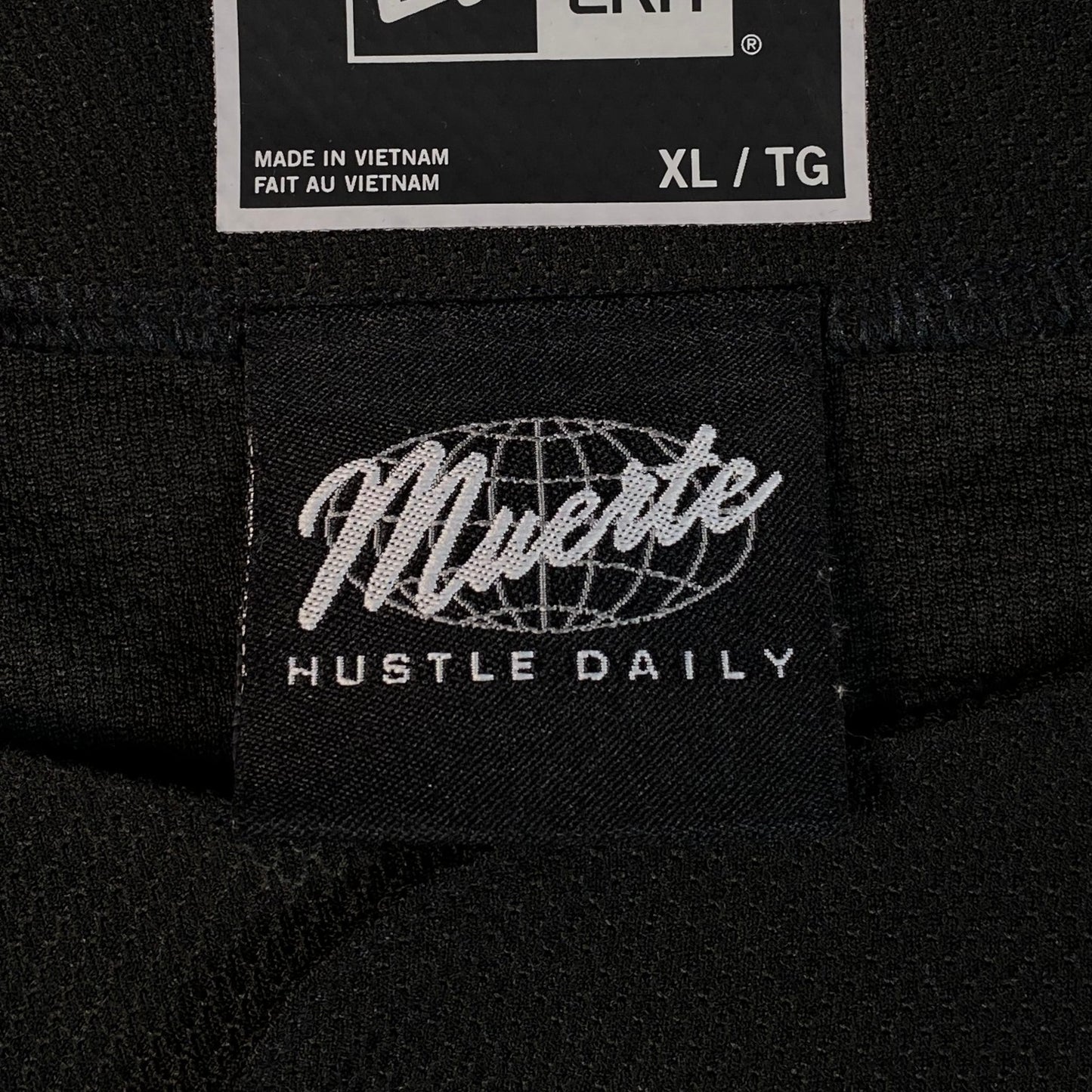 Digg It Thrift & Vintage New Era x Muerte Hustle Daily baseball jersey black fabric tag with XL size label