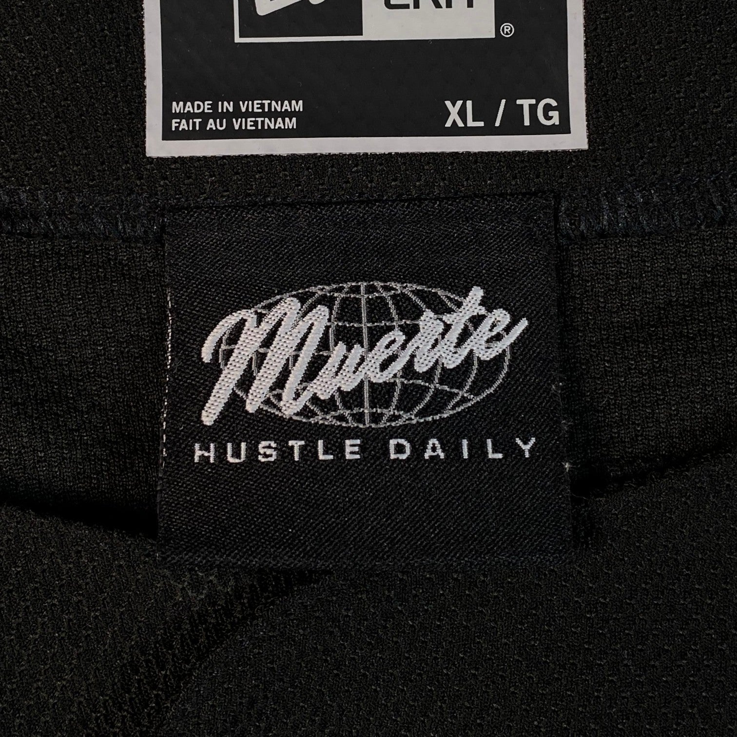 Digg It Thrift & Vintage New Era x Muerte Hustle Daily baseball jersey black fabric tag with XL size label