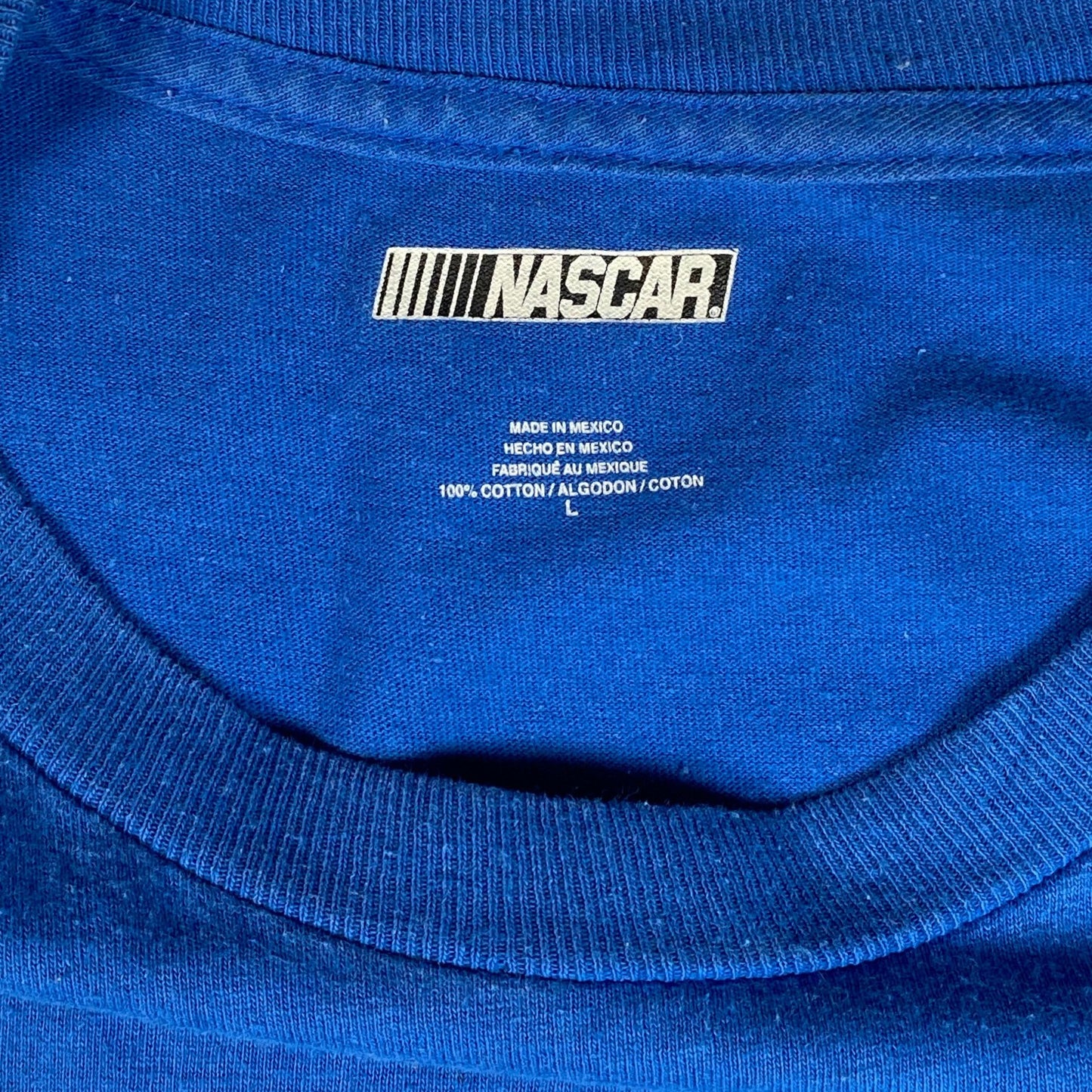 Digg It Thrift & Vintage royal blue NASCAR cotton t-shirt interior neck label showing size large