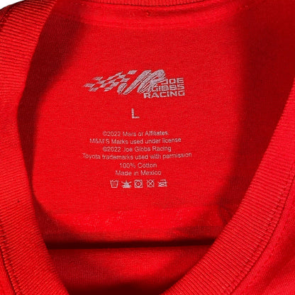 Digg It Thrift & Vintage red NASCAR T-shirt interior neck label showing Joe Gibbs Racing and M&M's branding