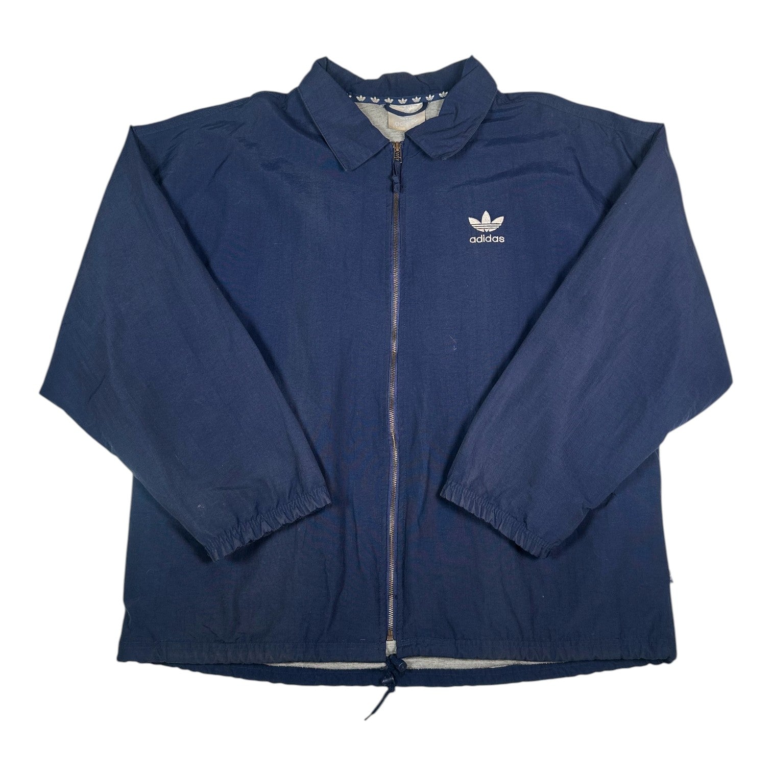 Digg It Thrift & Vintage navy Adidas coach jacket with white embroidered Trefoil logo and full zip front