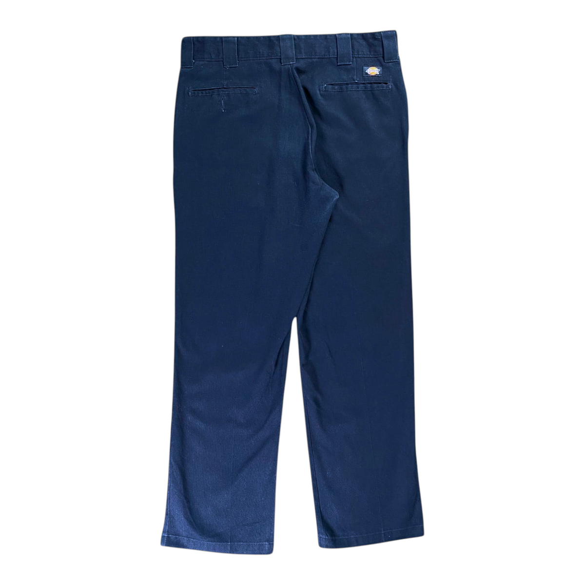 Digg It Thrift & Vintage navy blue Dickies 874 Flex work pants, back view showing straight-leg fit and pockets.