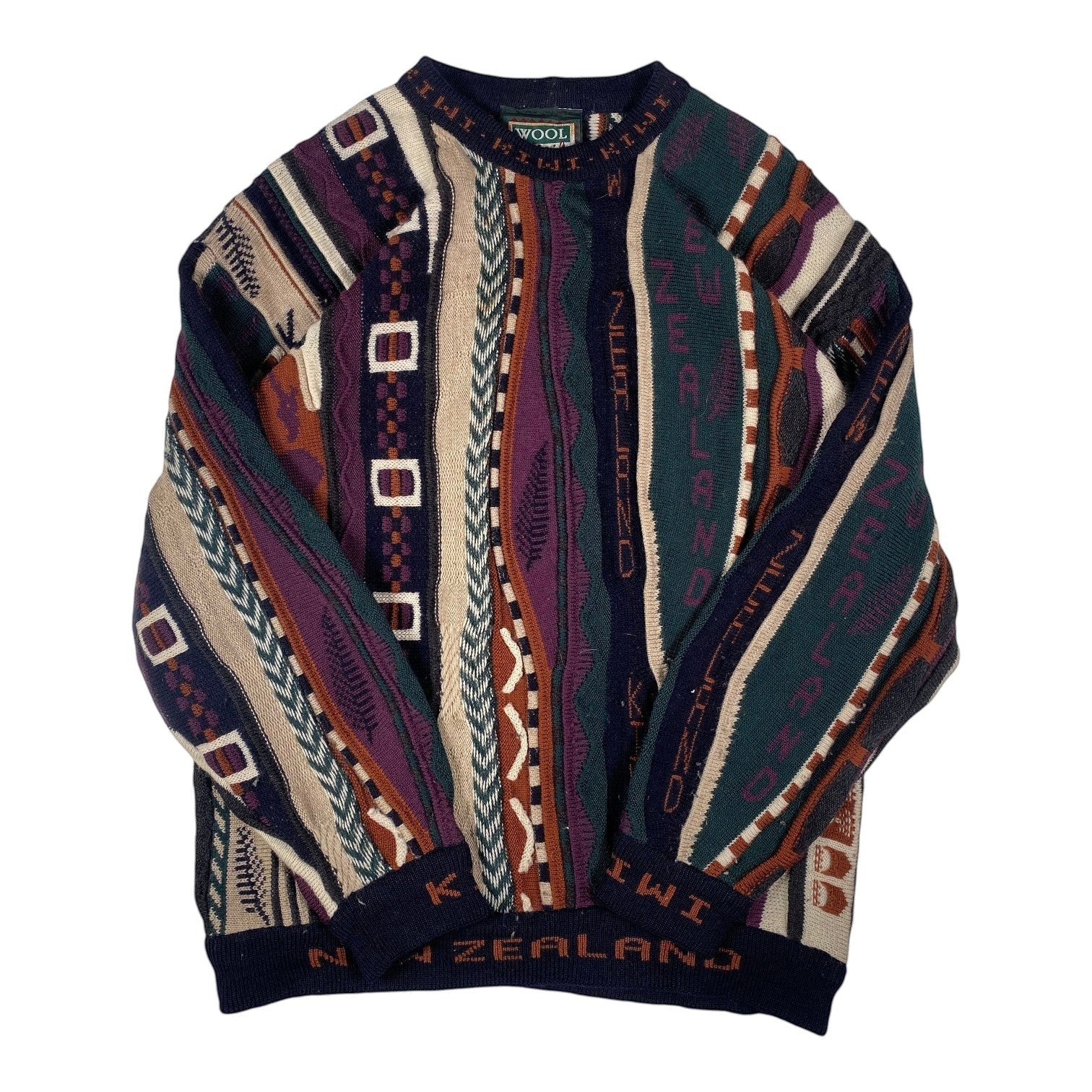 Digg It Thrift & Vintage Wool Alive New Zealand textured knit crewneck sweater with multi-coloured geometric patterns.