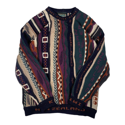 Digg It Thrift & Vintage Wool Alive New Zealand textured knit crewneck sweater with multi-coloured geometric patterns.