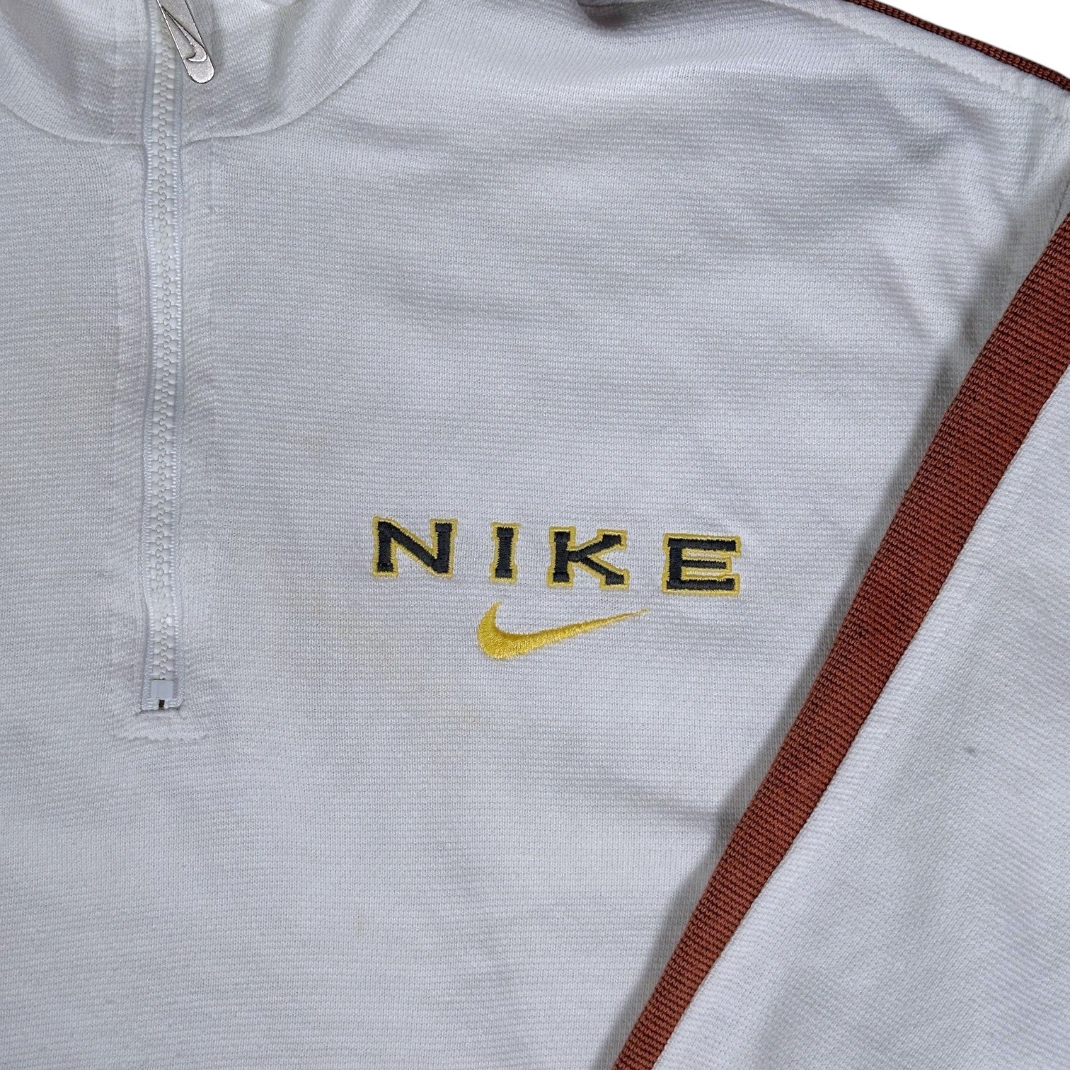 Digg It Thrift & Vintage white Nike quarter-zip sweatshirt with brown sleeve tape and embroidered logo detail