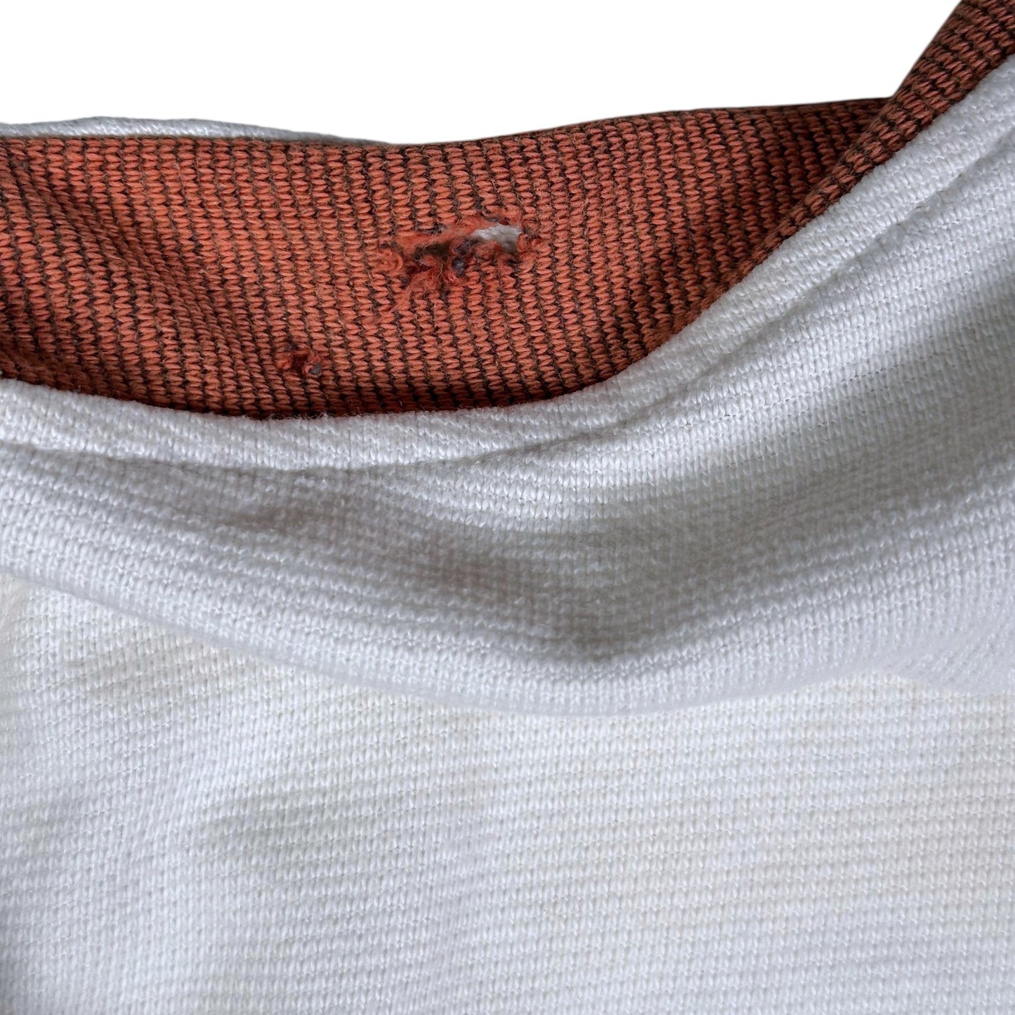 Digg It Thrift & Vintage Nike white and brown quarter-zip sweatshirt showing wear and tear on the collar fabric