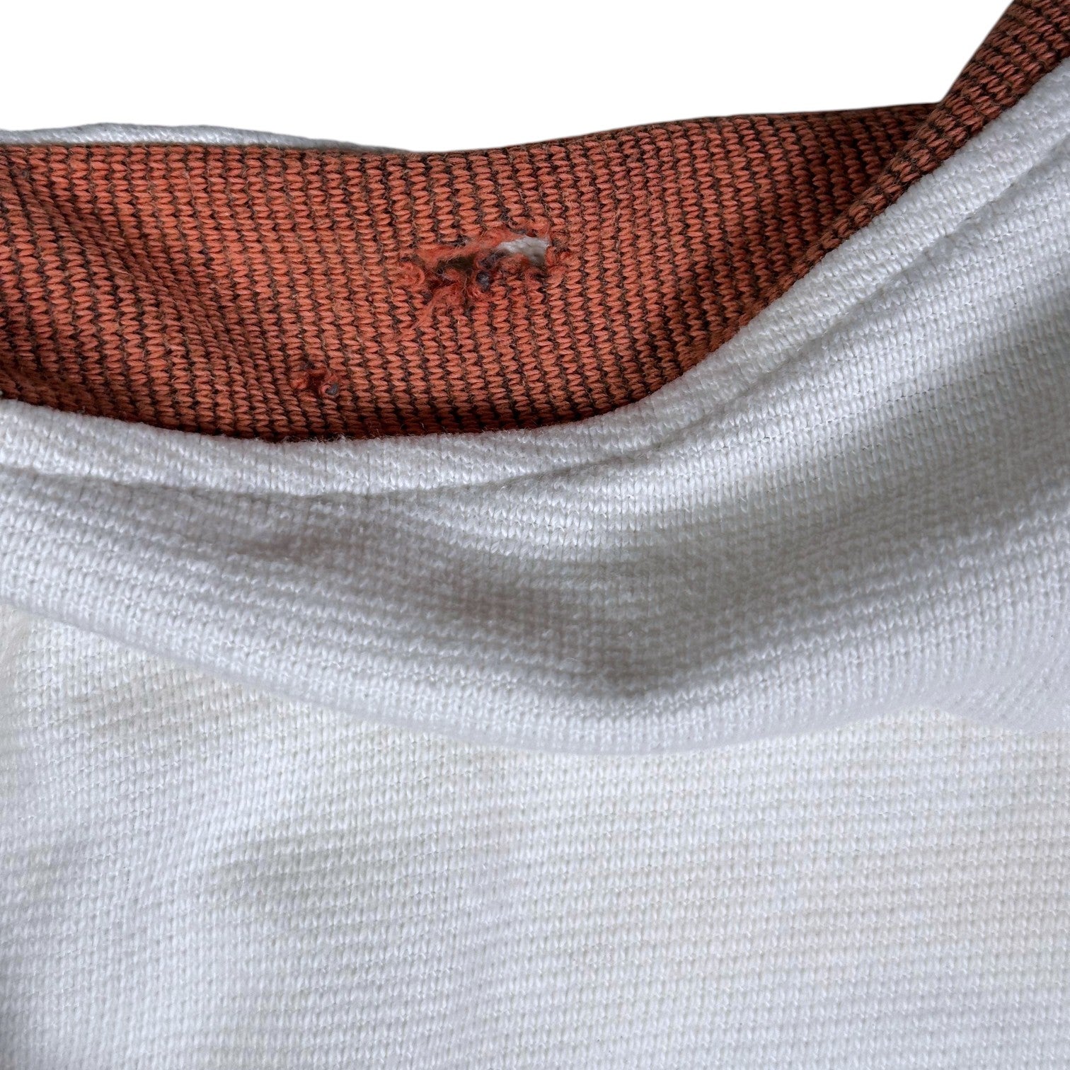 Digg It Thrift & Vintage Nike white and brown quarter-zip sweatshirt showing wear and tear on the collar fabric