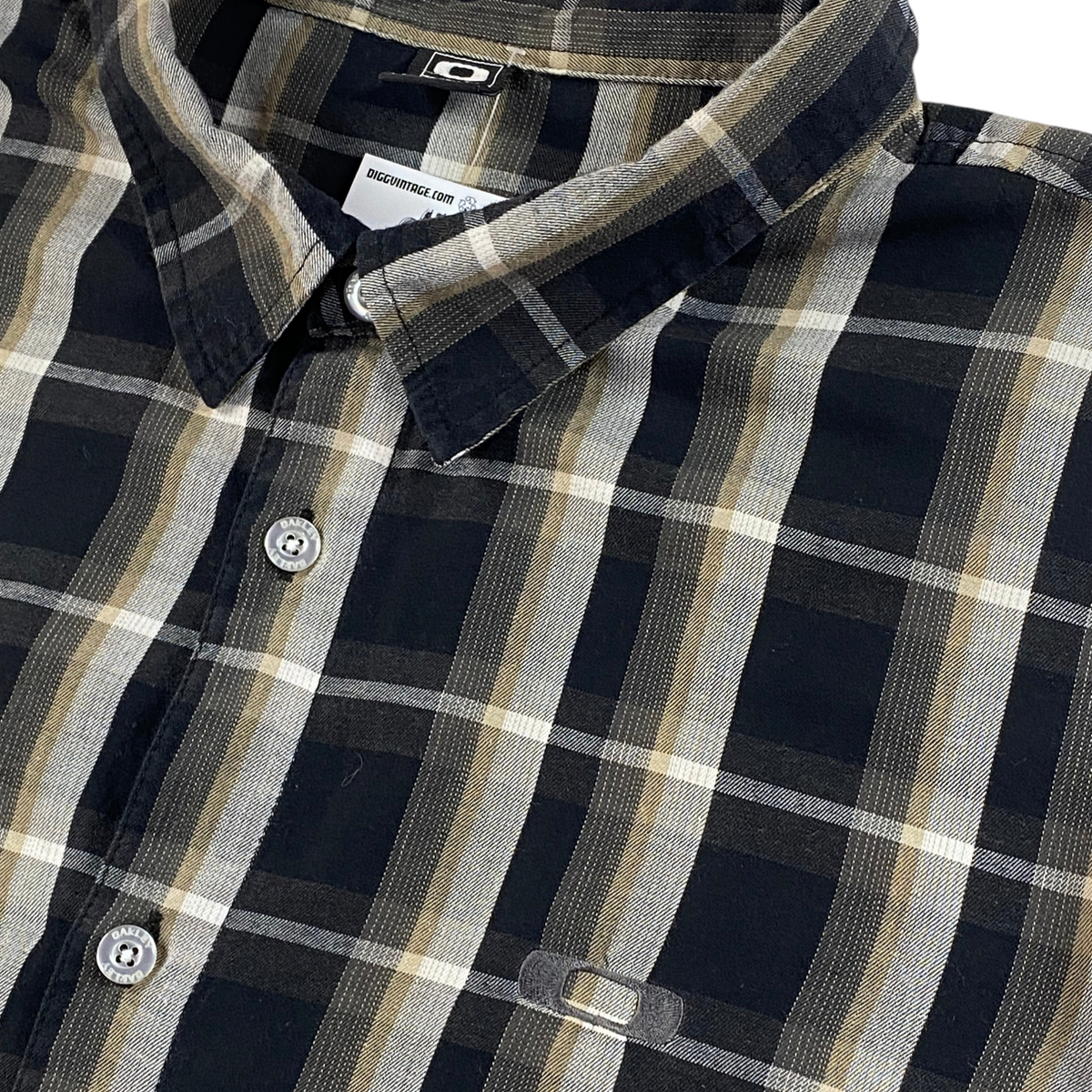 Digg It Thrift & Vintage Oakley black and tan plaid short sleeve button down shirt with branded buttons