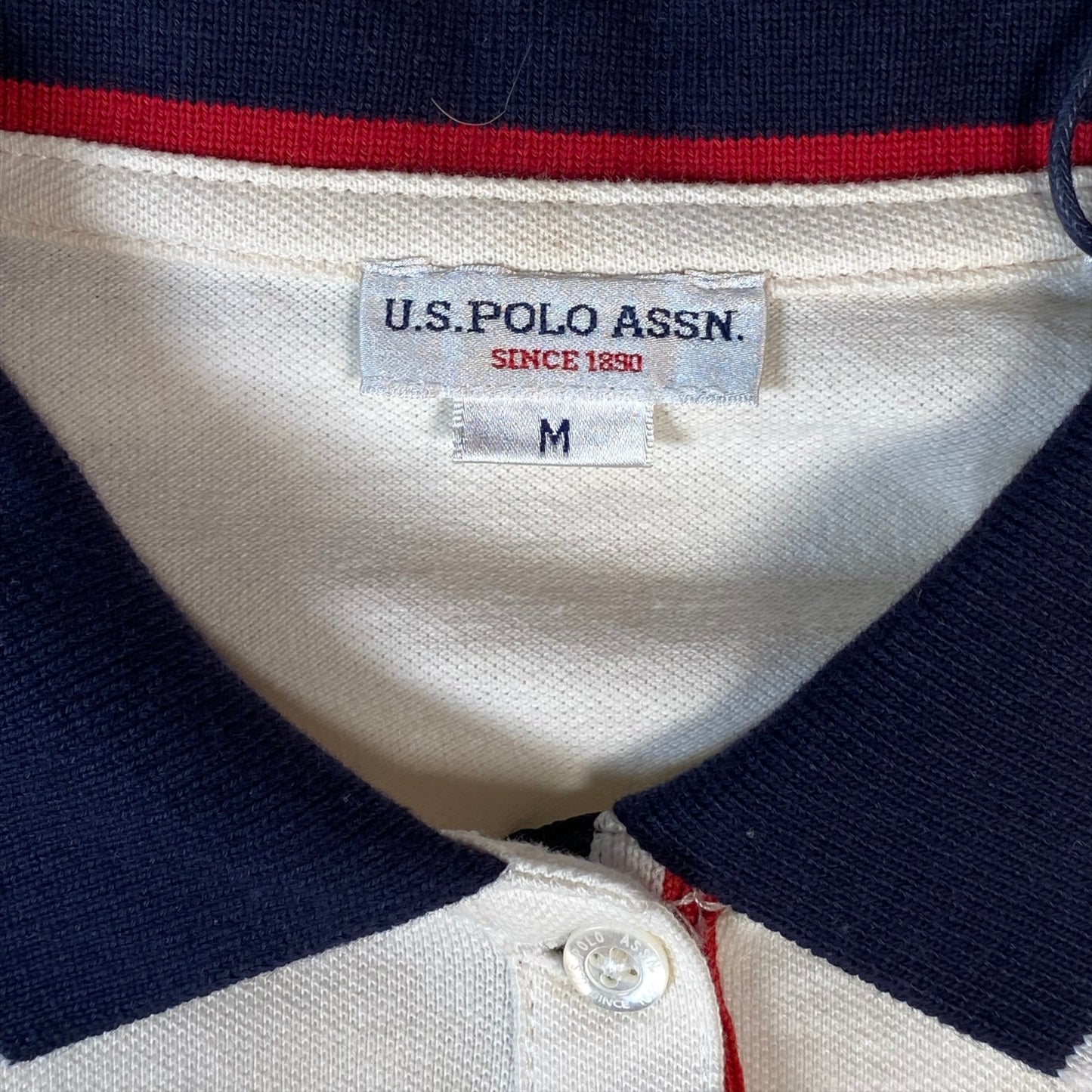 Digg It Thrift & Vintage off-white U.S. Polo Assn. long sleeve polo shirt with navy and red collar details