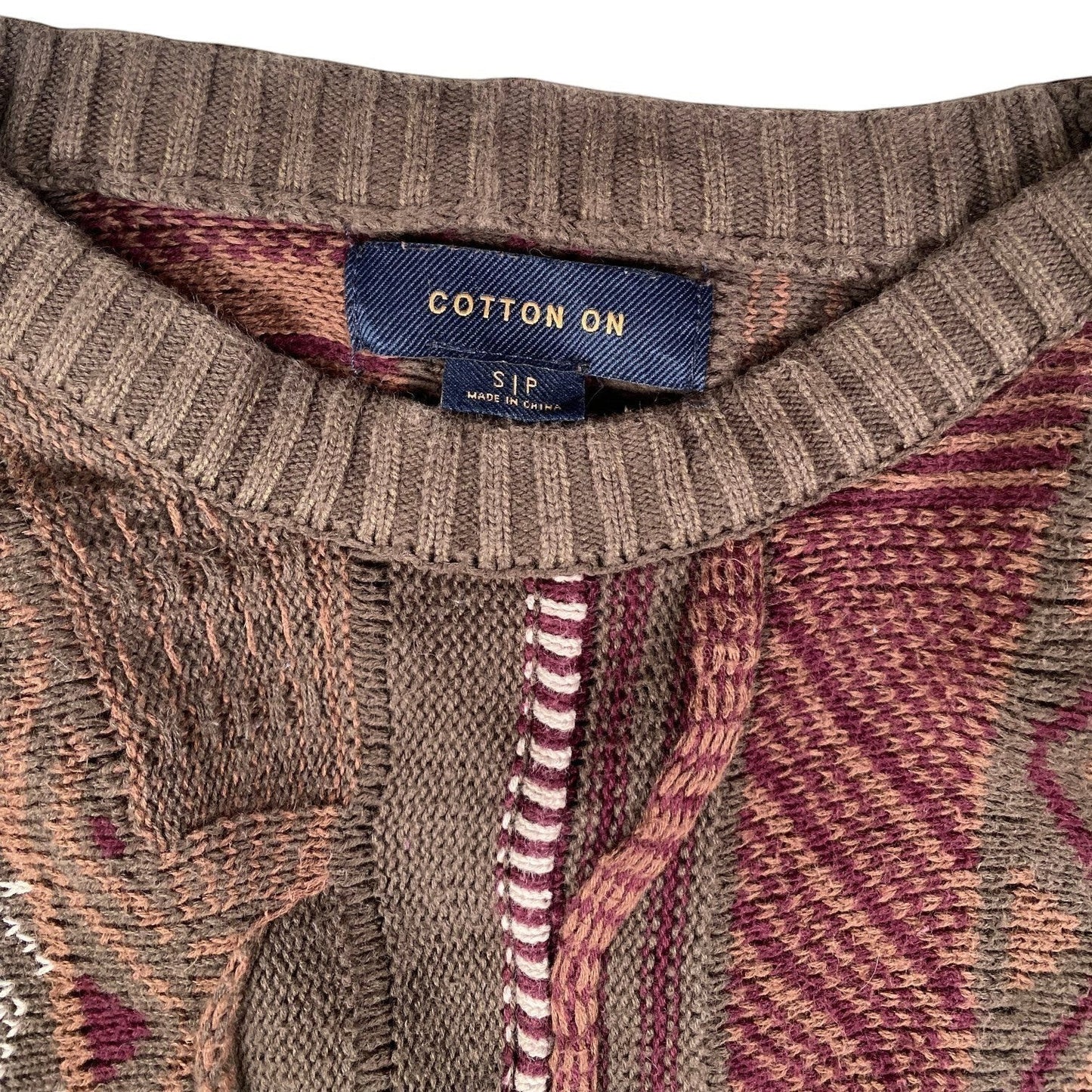 Digg It Thrift & Vintage Cotton On earthy patchwork knit sweater with textured multi-pattern design and ribbed collar