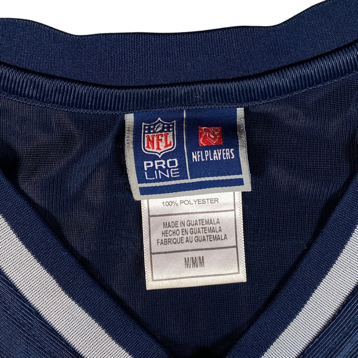 Digg It Thrift & Vintage NFL Pro Line New England Patriots jersey neck label showing 100% polyester material