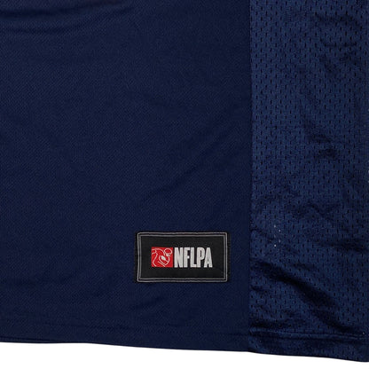 Digg It Thrift & Vintage New England Patriots jersey featuring an NFLPA patch on navy blue mesh fabric