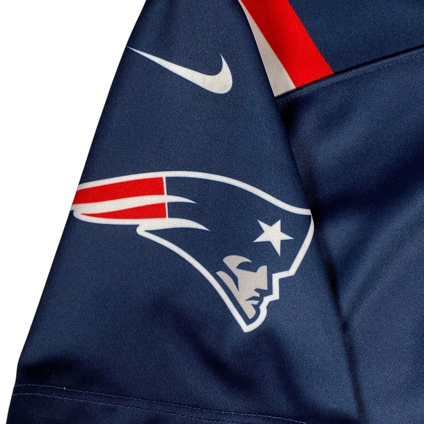 Digg It Thrift & Vintage Nike New England Patriots NFL jersey sleeve with team logo and white swoosh