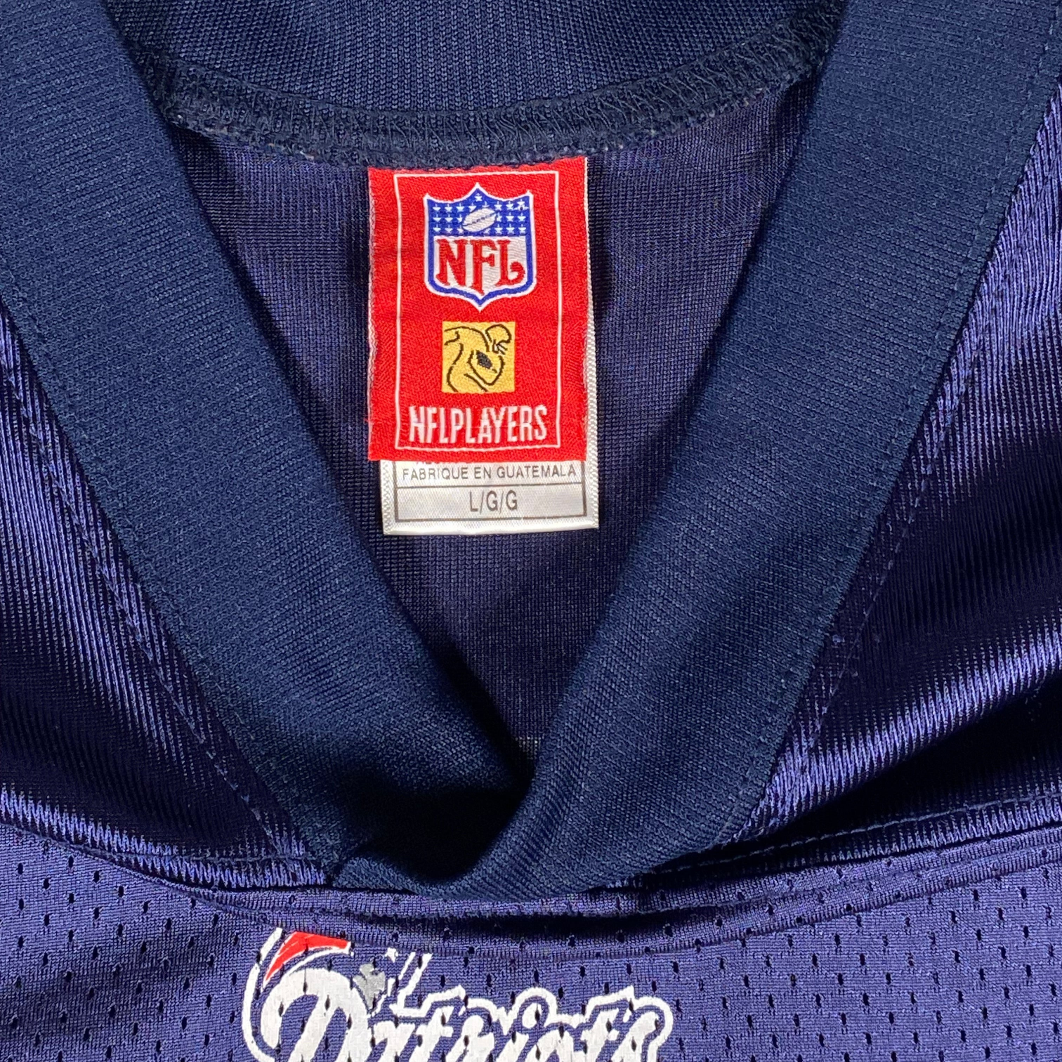Digg It Thrift & Vintage New England Patriots NFL jersey collar tag showing size large and official NFL branding