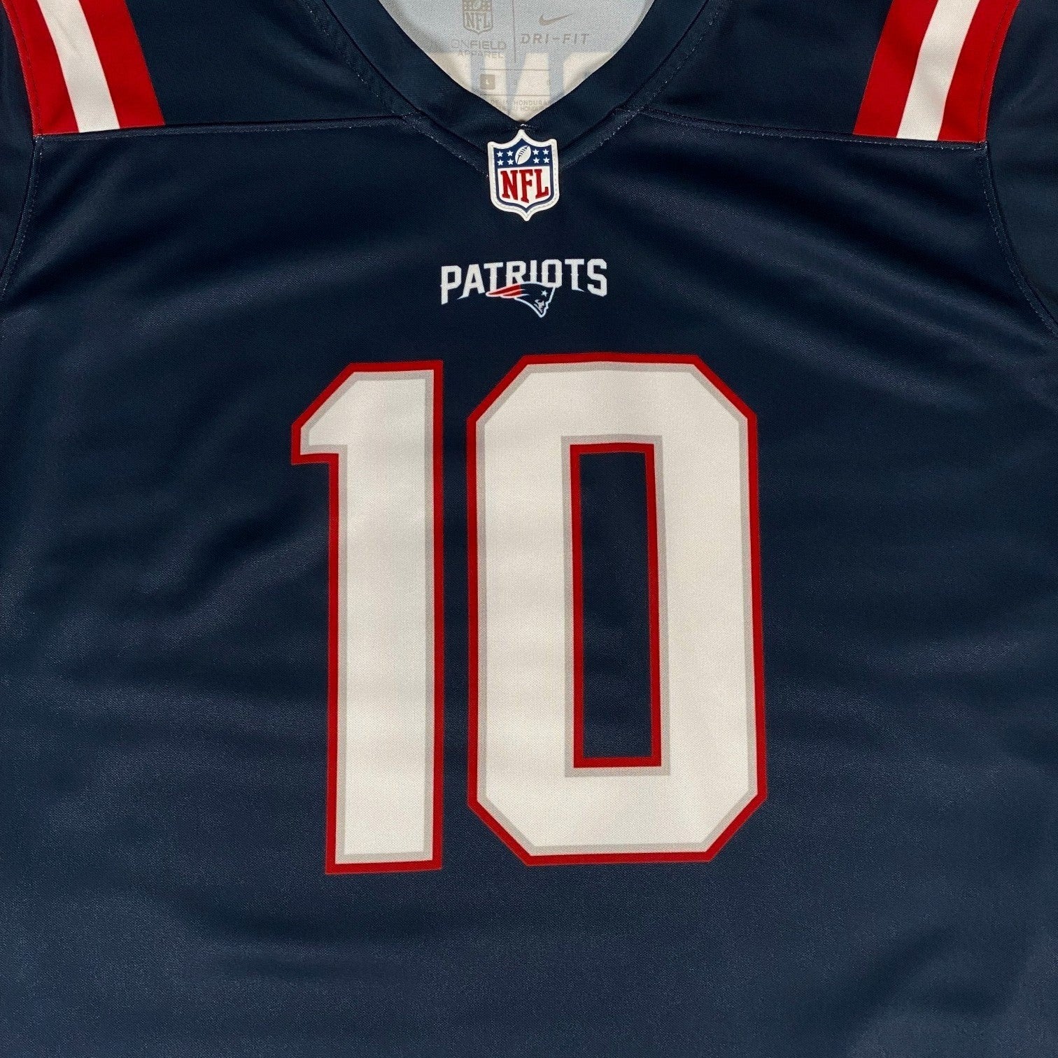 Digg It Thrift & Vintage New England Patriots Mac Jones jersey in navy blue with red and white details