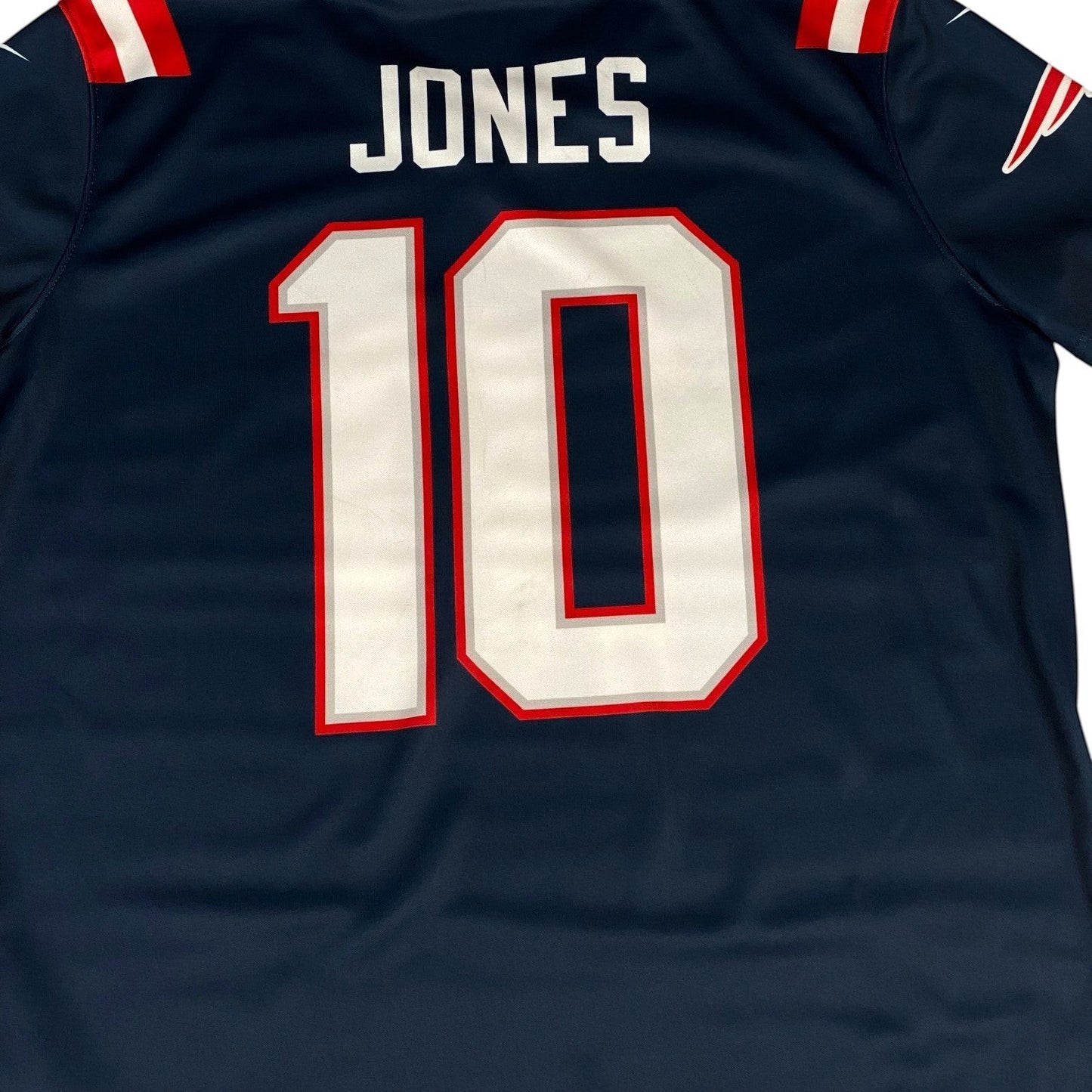 Digg It Thrift & Vintage navy blue Nike New England Patriots Mac Jones NFL jersey with white and red number 10