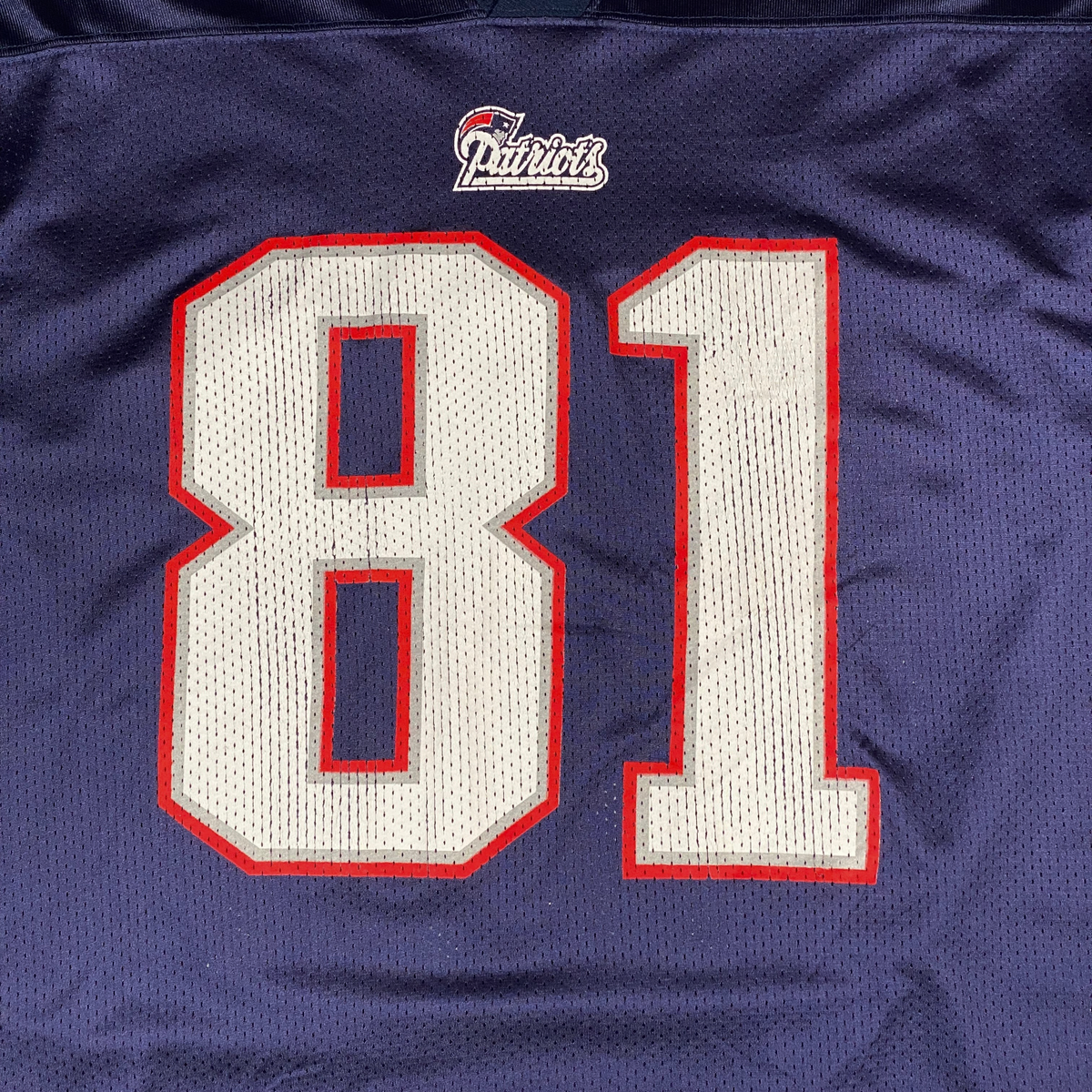 Digg It Thrift & Vintage navy blue New England Patriots Randy Moss jersey with white 81 and red trim