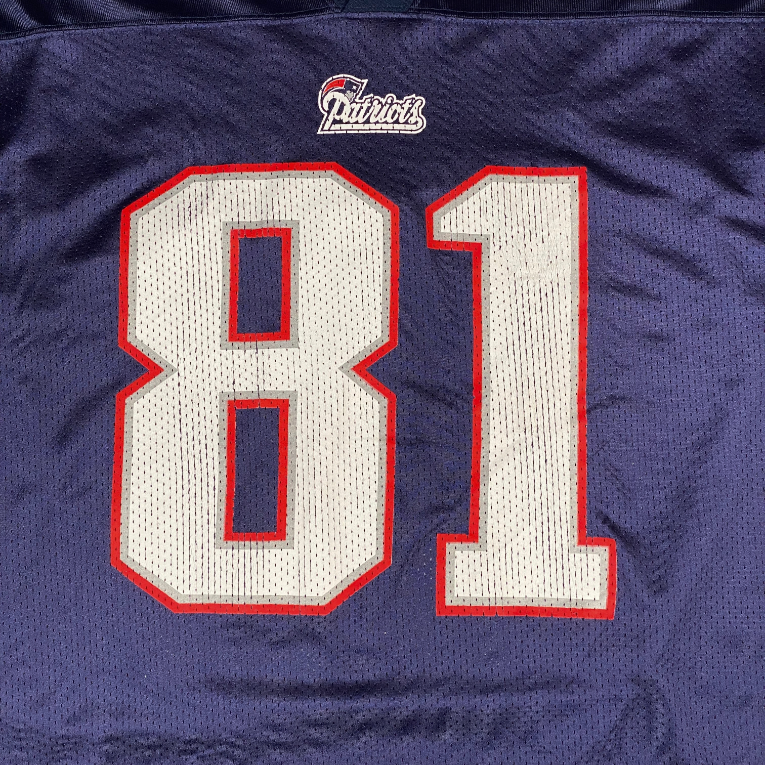 Digg It Thrift & Vintage navy blue New England Patriots Randy Moss jersey with white 81 and red trim