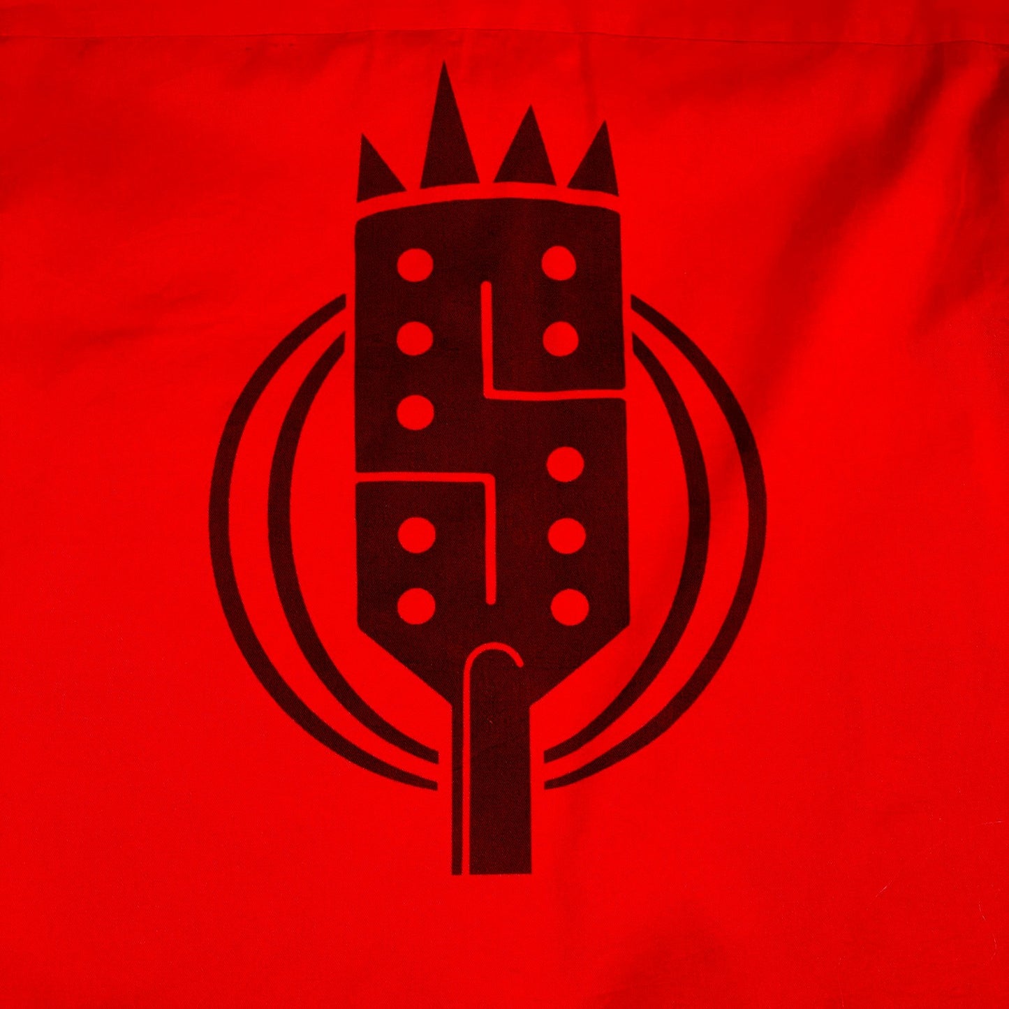 Digg It Thrift & Vintage red Dickies work shirt featuring a black graphic print of a stylized crown and domino