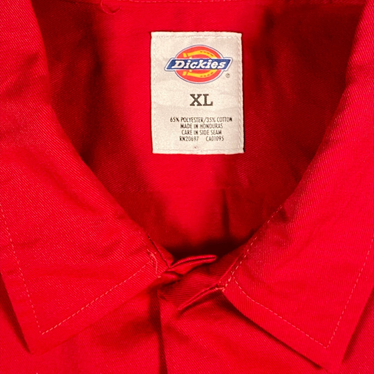 Digg It Thrift & Vintage red Dickies work shirt collar with size XL label and polyester cotton blend tag