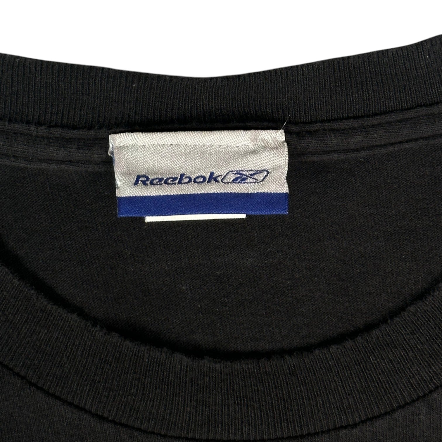 Digg It Thrift & Vintage Reebok brand tag on a black Pittsburgh Steelers Super Bowl XL t-shirt