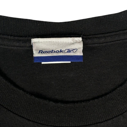 Digg It Thrift & Vintage Reebok brand tag on a black Pittsburgh Steelers Super Bowl XL t-shirt