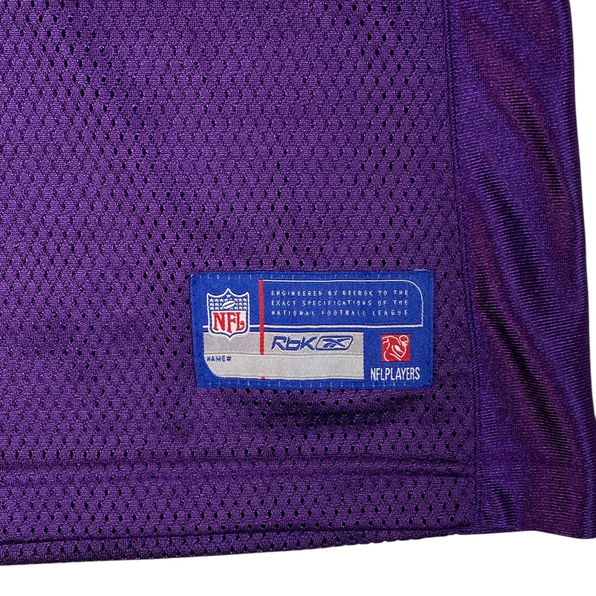 Digg It Thrift & Vintage purple Reebok NFL Minnesota Vikings jersey mesh fabric detail with official league tag
