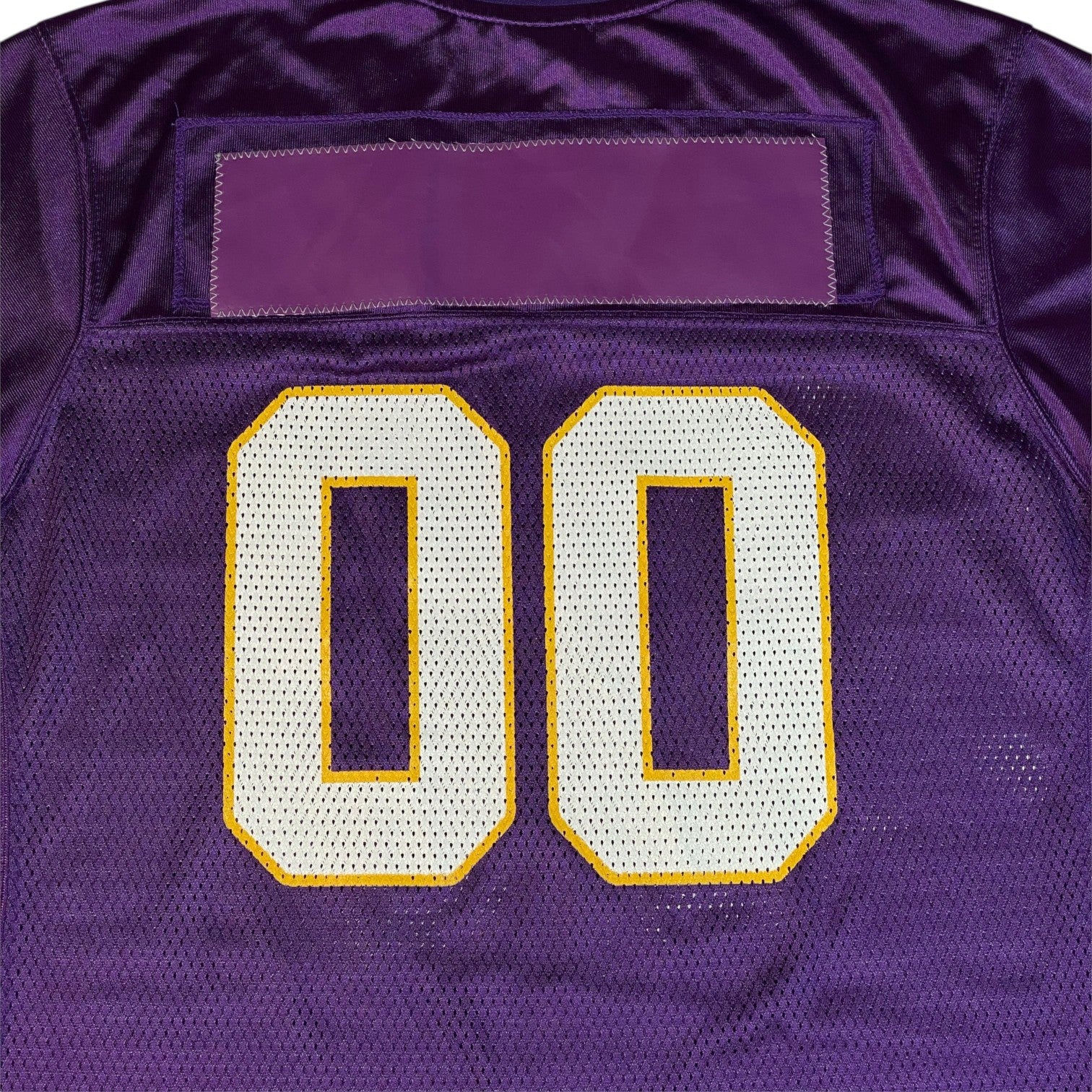 Digg It Thrift & Vintage purple Reebok Minnesota Vikings jersey with white and yellow 00 numbers on mesh fabric