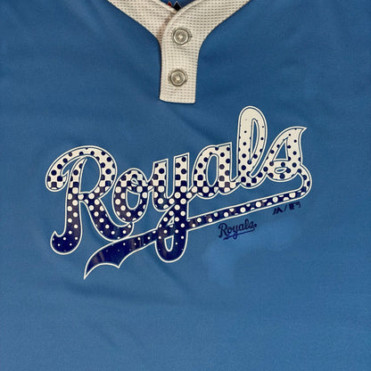 Digg It Thrift & Vintage blue Kansas City Royals henley jersey with white polka dot logo and button placket