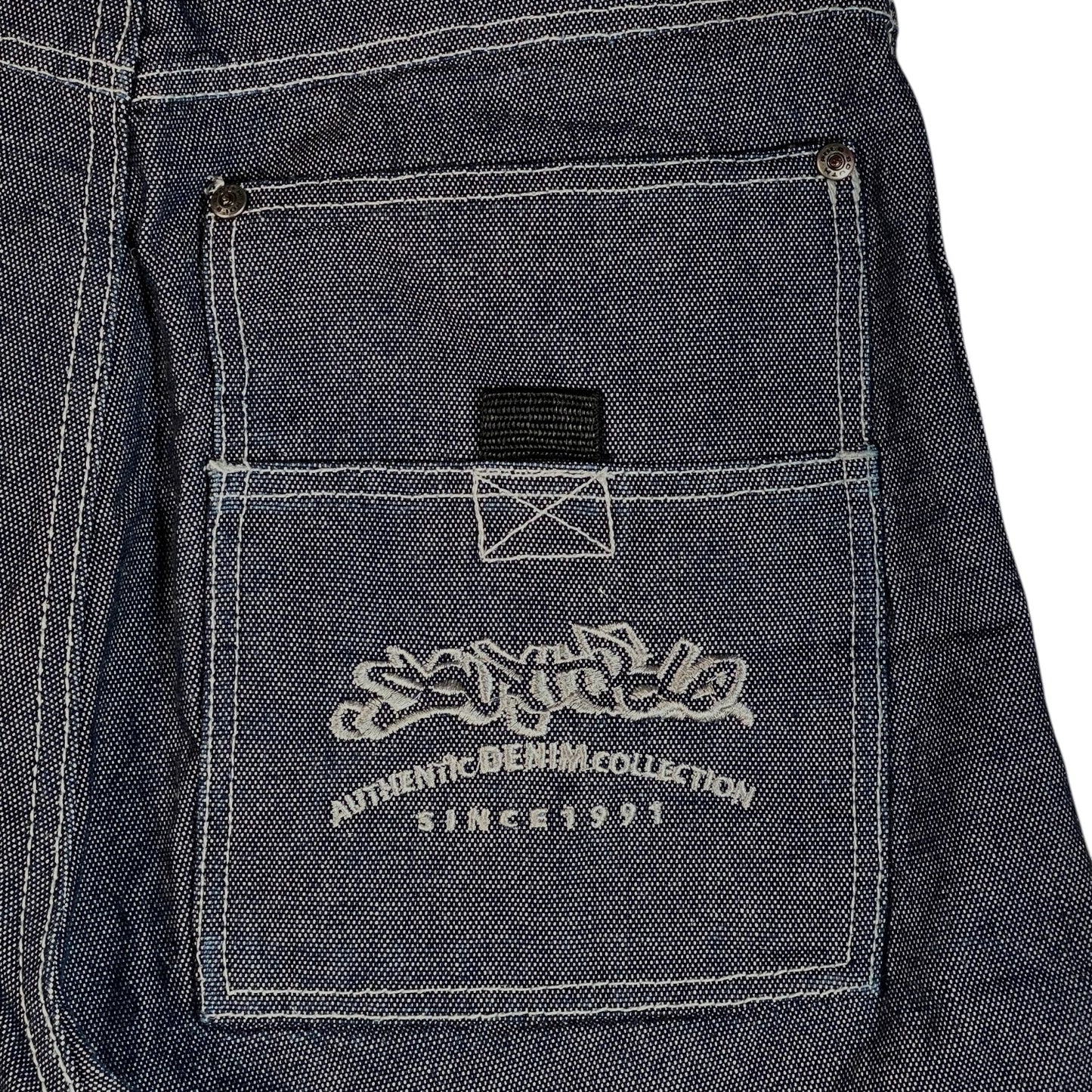 Digg It Thrift & Vintage Southpole baggy denim jorts featuring raw dark wash fabric and white contrast stitching