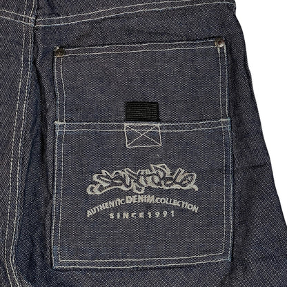 Digg It Thrift & Vintage Southpole baggy denim jorts featuring raw dark wash fabric and white contrast stitching