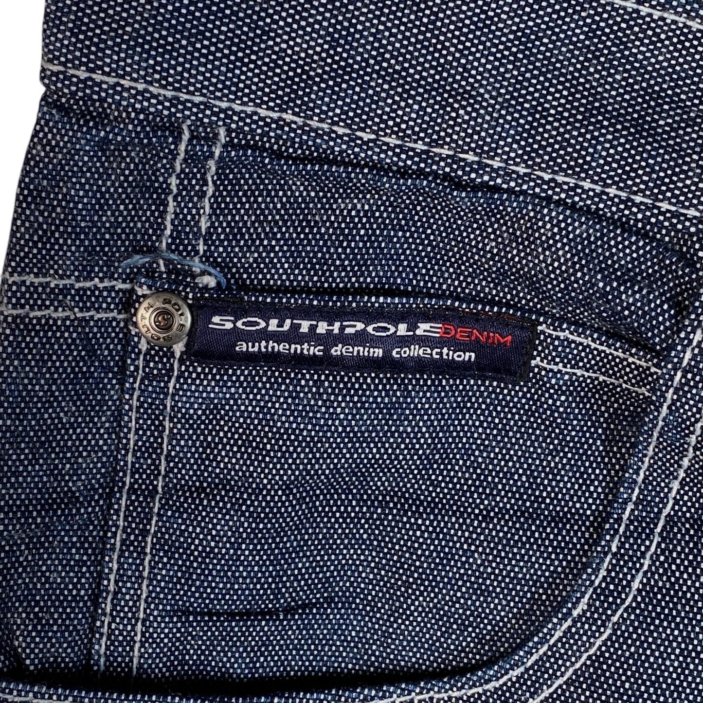 Digg It Thrift & Vintage Southpole raw denim jorts featuring contrast stitching and branded metal button detail