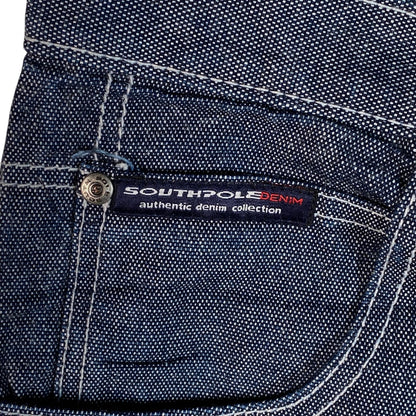 Digg It Thrift & Vintage Southpole raw denim jorts featuring contrast stitching and branded metal button detail