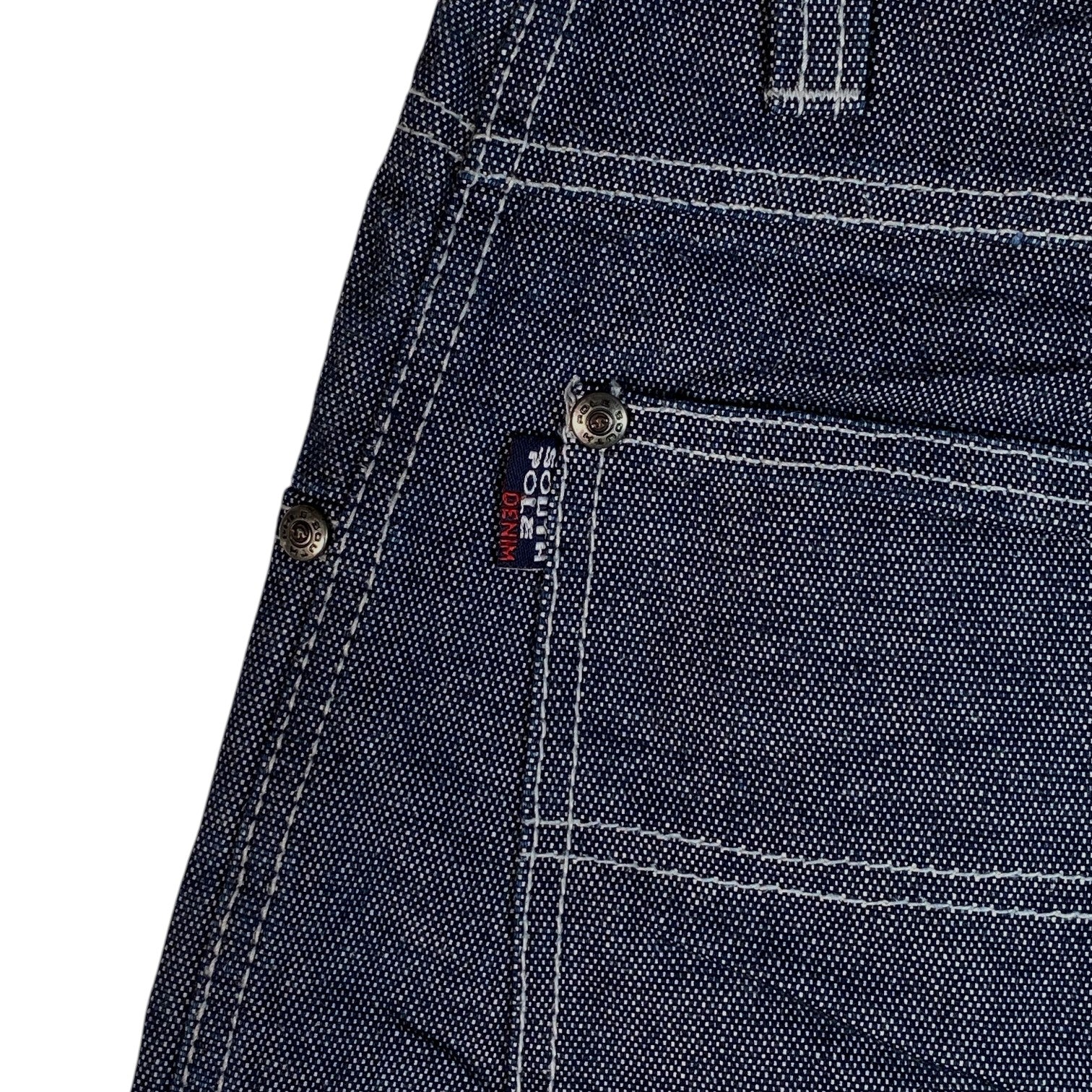 Digg It Thrift & Vintage Southpole dark wash denim jorts featuring raw contrast stitching and branded metal rivets