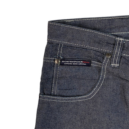 Digg It Thrift & Vintage Southpole dark blue denim jorts featuring white contrast stitching and a branded logo patch.
