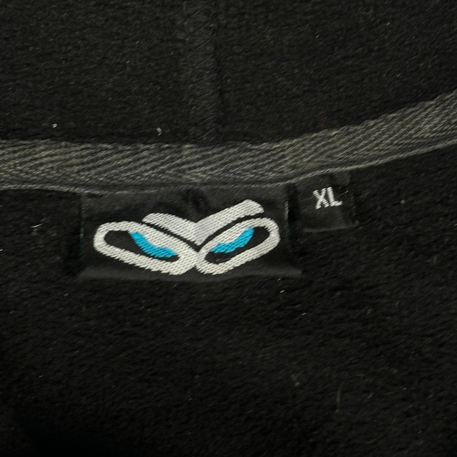 Digg It Thrift & Vintage black pullover hoodie with SRCN graffiti character logo and XL size tag