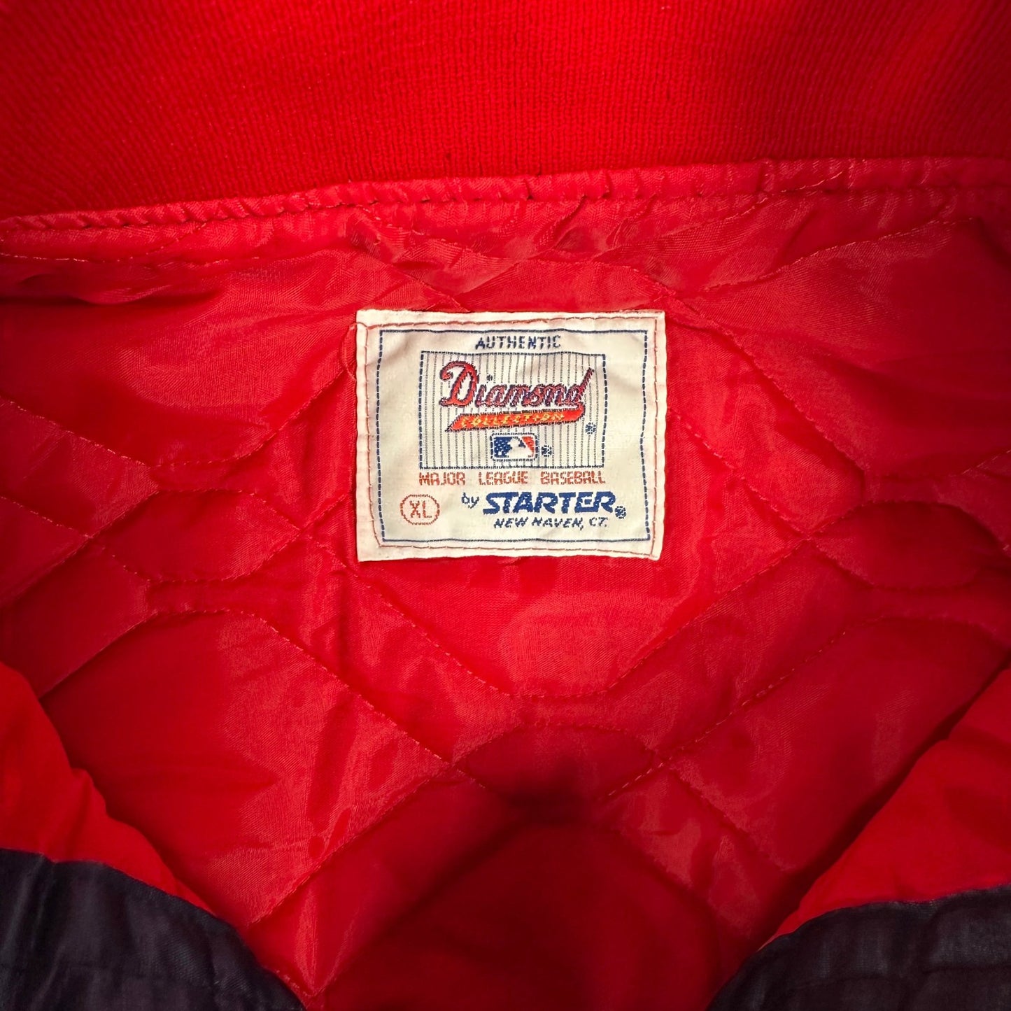 Digg It Thrift & Vintage Starter Atlanta Braves MLB satin bomber jacket interior label showing size XL