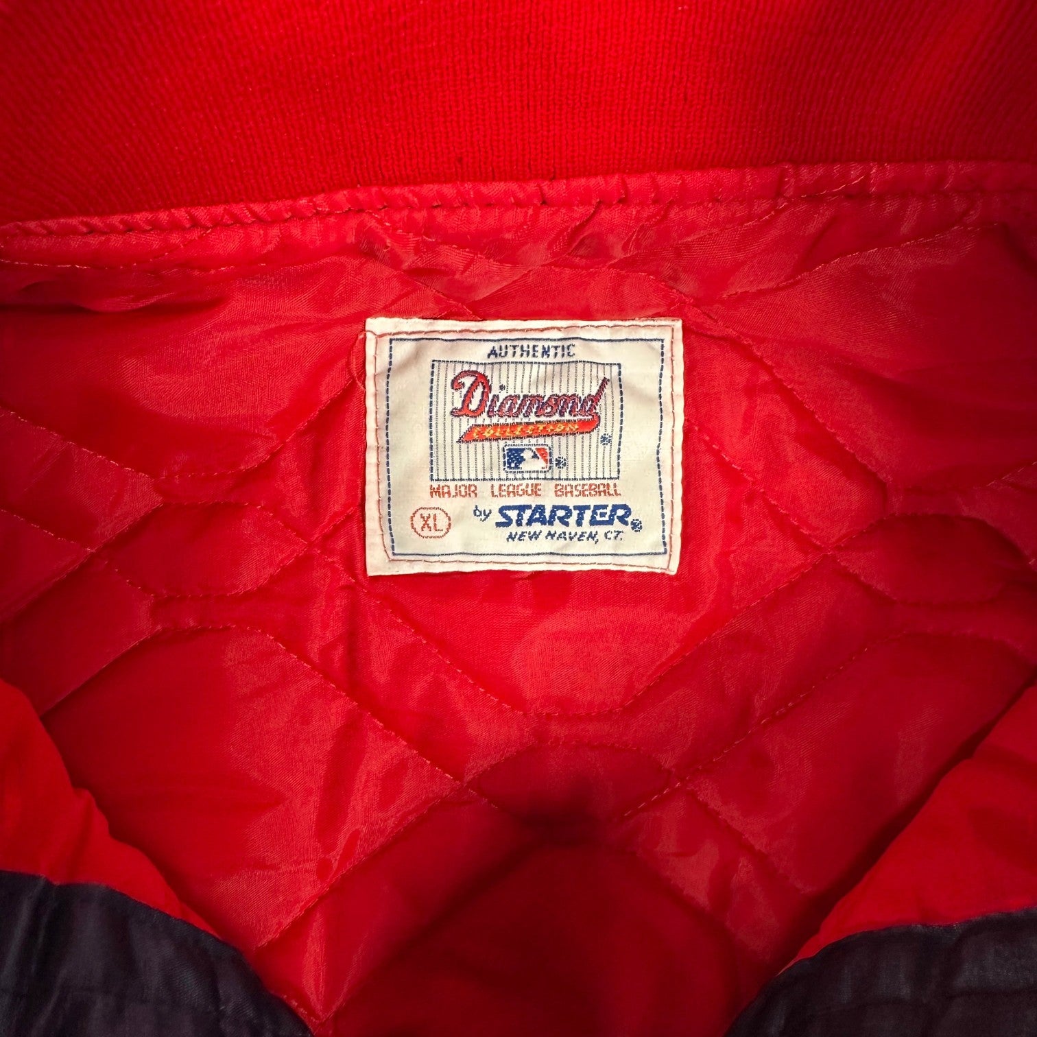Digg It Thrift & Vintage Starter Atlanta Braves MLB satin bomber jacket interior label showing size XL