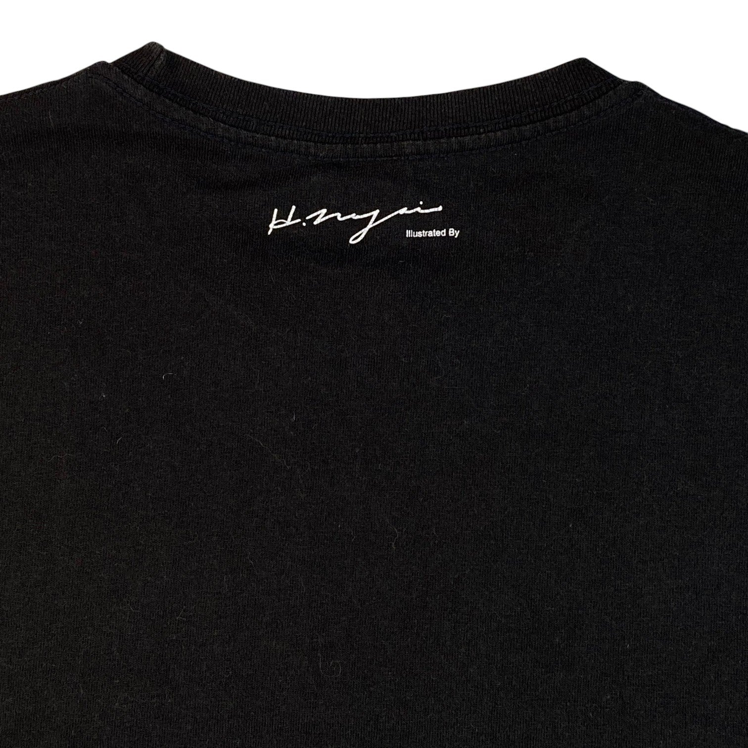 Digg It Thrift & Vintage black Stüssy x BAL Original t-shirt featuring a white Hiroshi Nagai signature on the neck