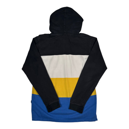 Back view of a Digg It Thrift & Vintage Stüssy colorblock hooded rugby sweatshirt with black, white, yellow, and blue.