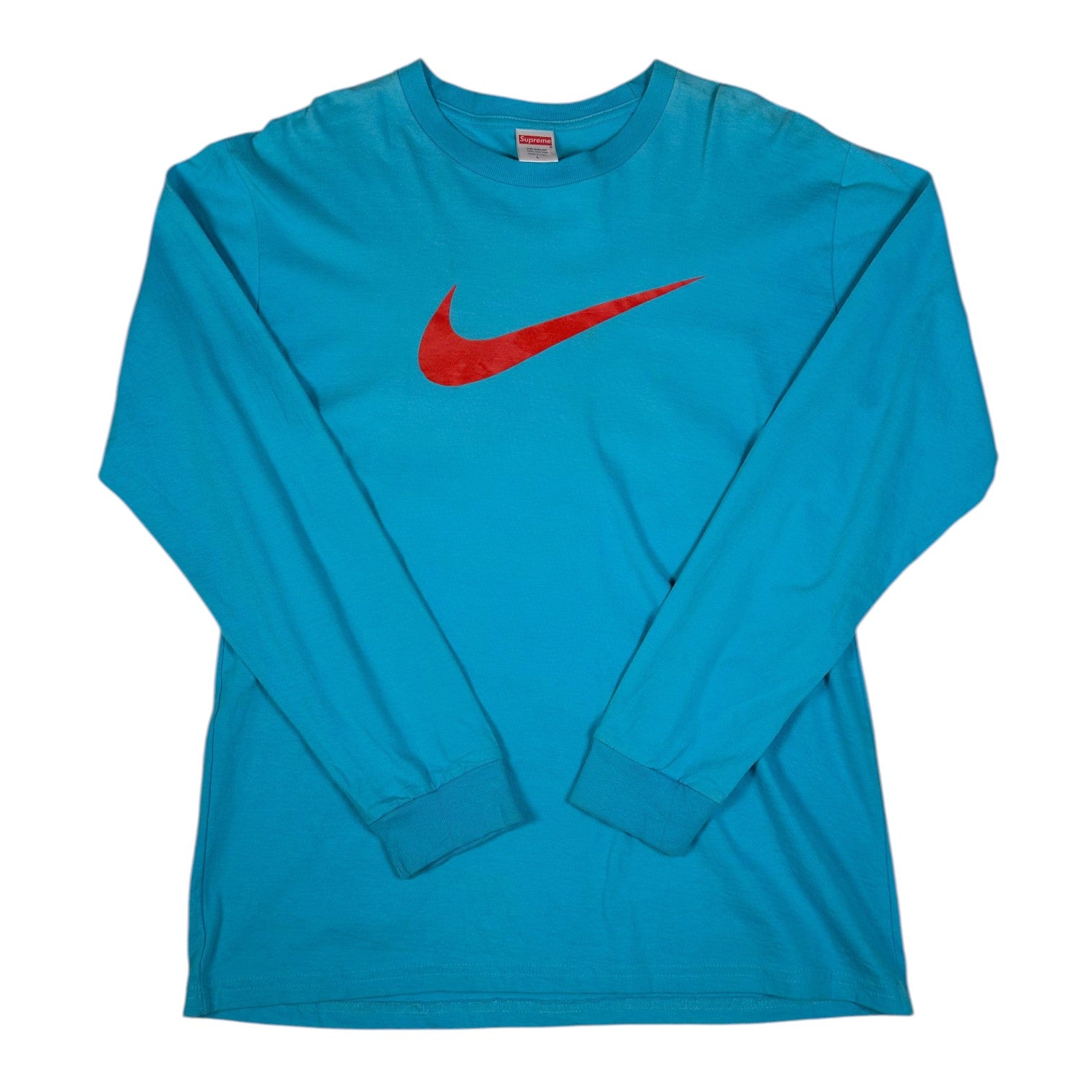 Digg It Thrift & Vintage teal blue Supreme x Nike long sleeve t-shirt with a large red swoosh logo on the chest