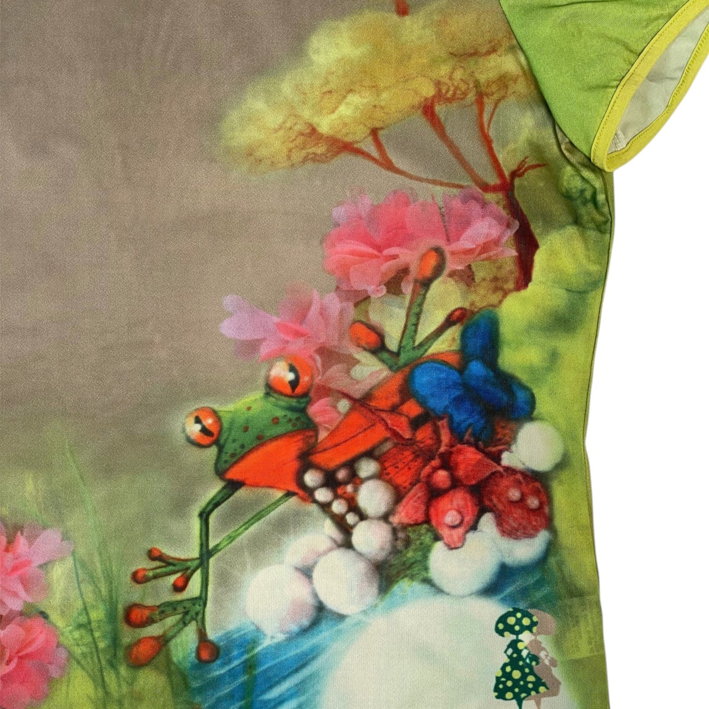 Digg It Thrift & Vintage Poupée Chic short sleeve top featuring a vibrant tree frog and floral graphic print