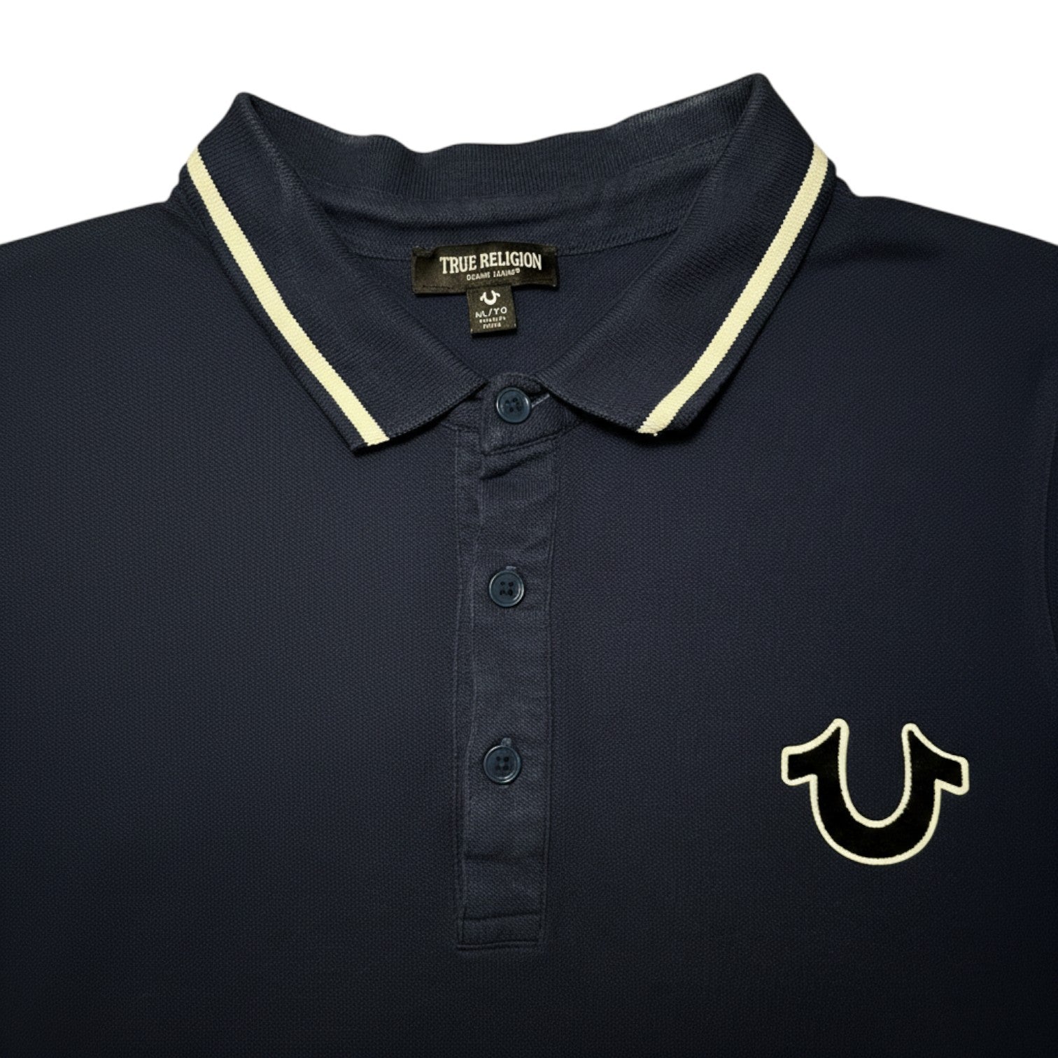 Digg It Thrift & Vintage navy blue True Religion polo shirt with white collar trim and horseshoe logo. Size XL (fits Large).