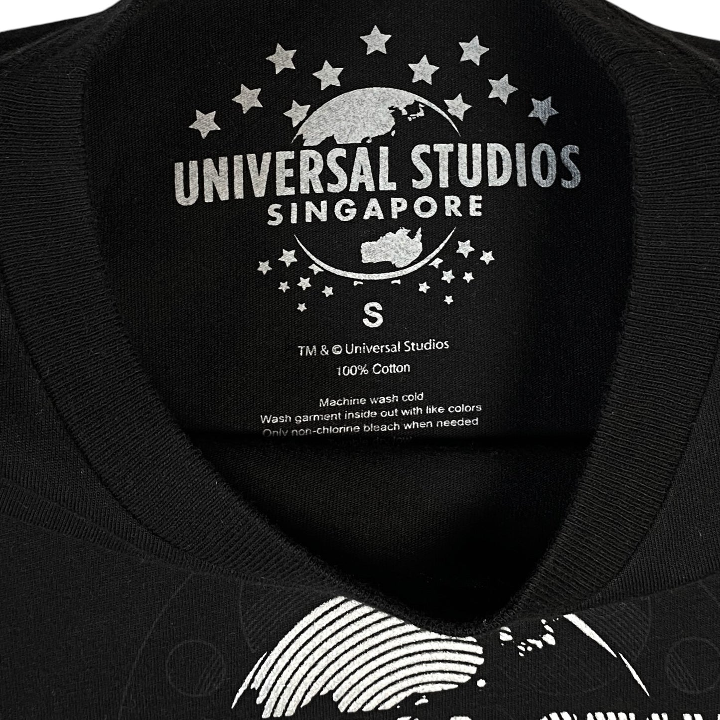 Digg It Thrift & Vintage black cotton Universal Studios Singapore t-shirt with silver globe logo neck label