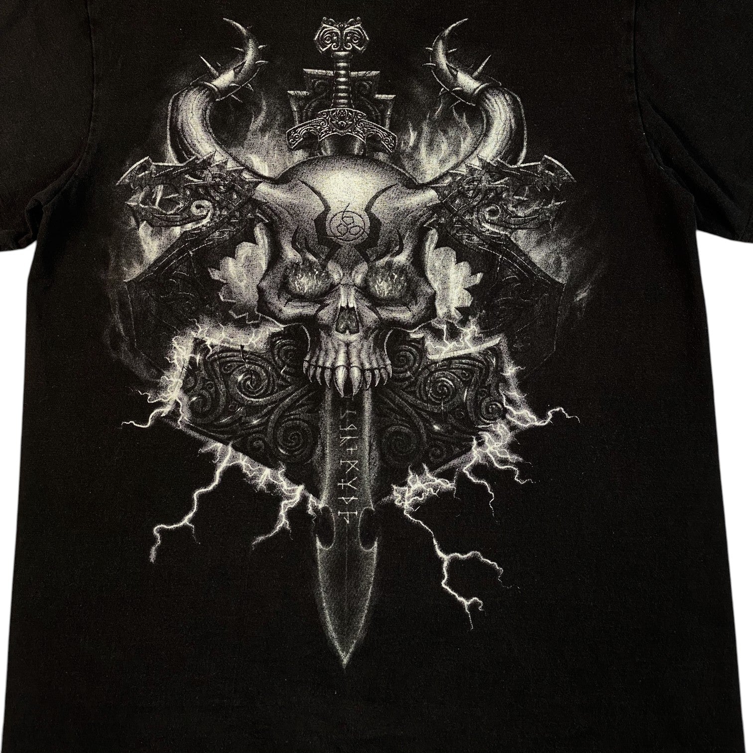 Digg It Thrift & Vintage black t-shirt featuring a detailed Viking skull, runed dagger, and lightning graphic print.