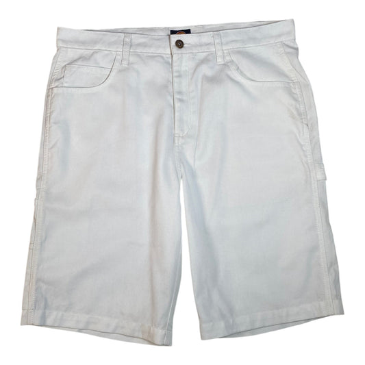 Digg It Thrift & Vintage white canvas utility carpenter shorts with a button fly and side pockets.